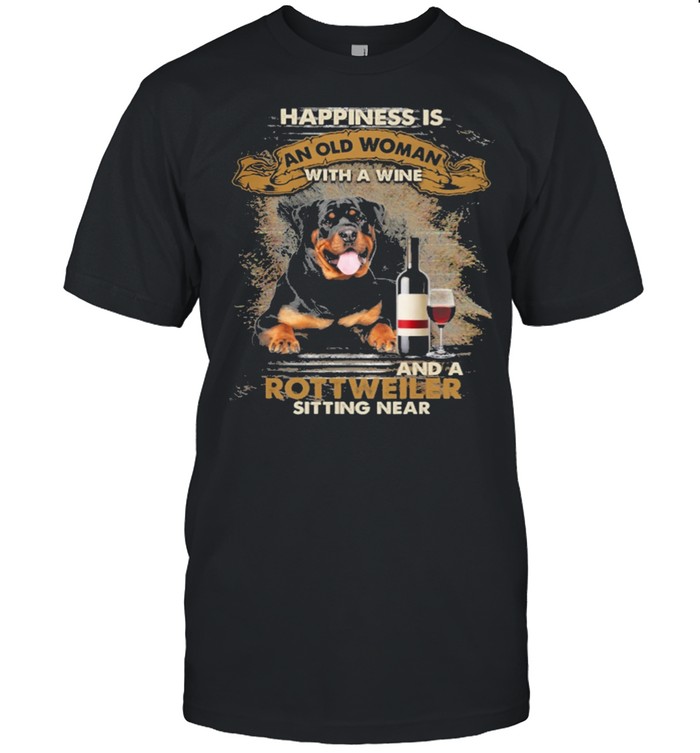 Happiness is an old woman with a and a coffee Rottweiler sitting in shirt
